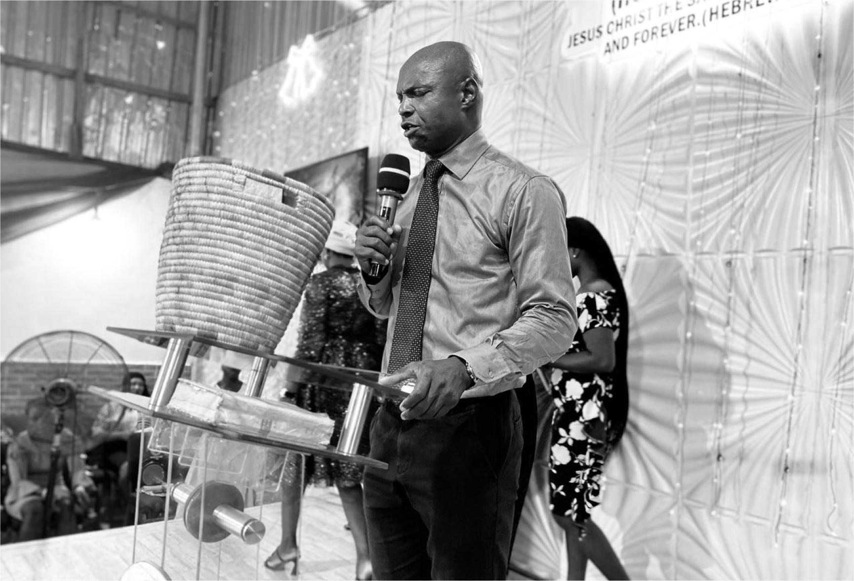 Pastor Andrew praying